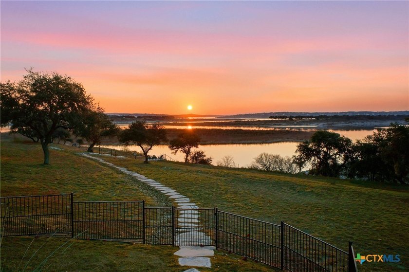 Experience true lakefront living in this stunning custom home - photo 33