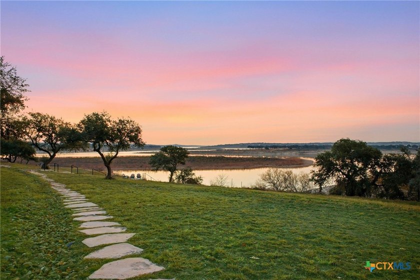 Experience true lakefront living in this stunning custom home - photo 35