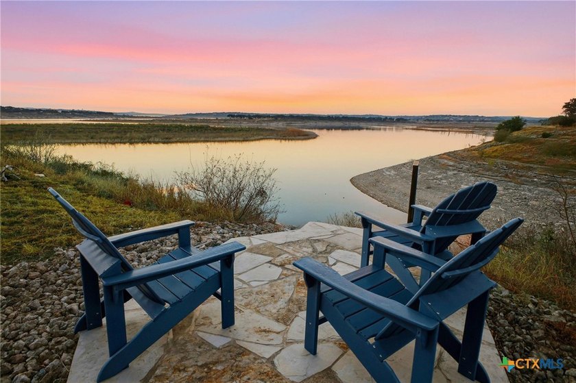 Experience true lakefront living in this stunning custom home - photo 36