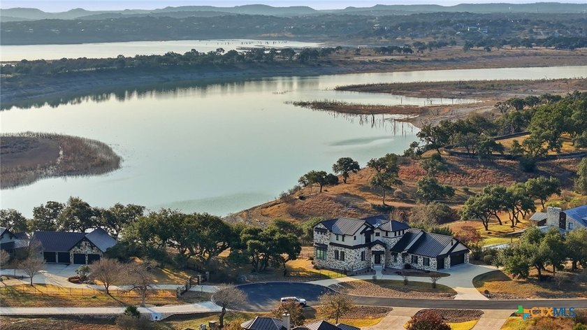 Experience true lakefront living in this stunning custom home - photo 44