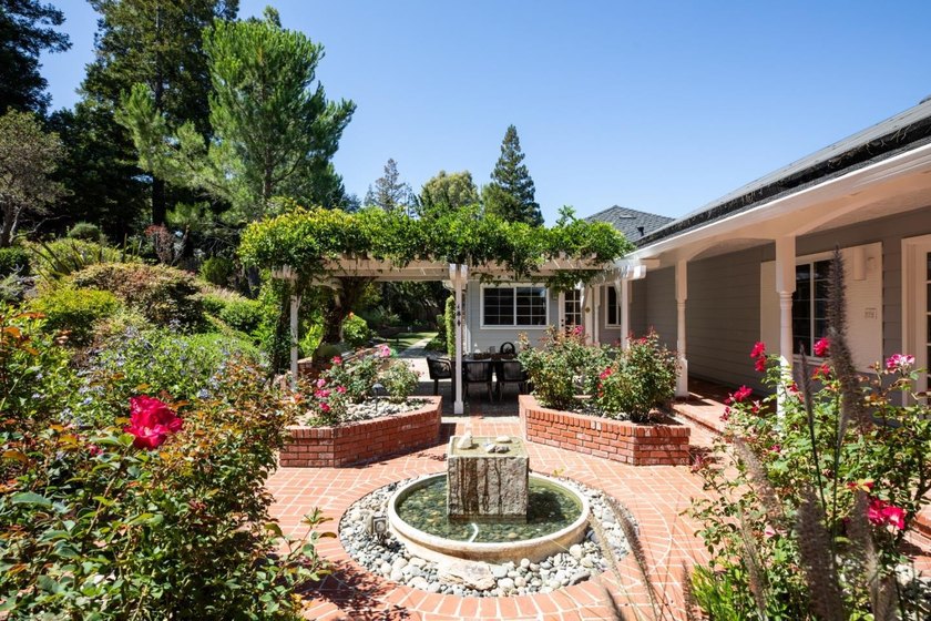 Situated on a pristine, park-like 0.92-acre lot, this stunning 3 - photo 29