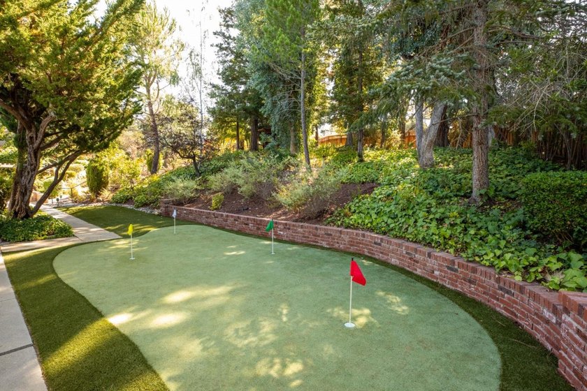 Situated on a pristine, park-like 0.92-acre lot, this stunning 3 - photo 44