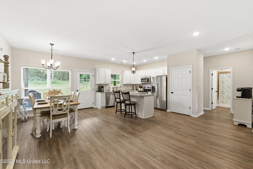 Better than New ~ Built in 2023 ~ 4 Bedroom 3 Bath Home with - photo 6