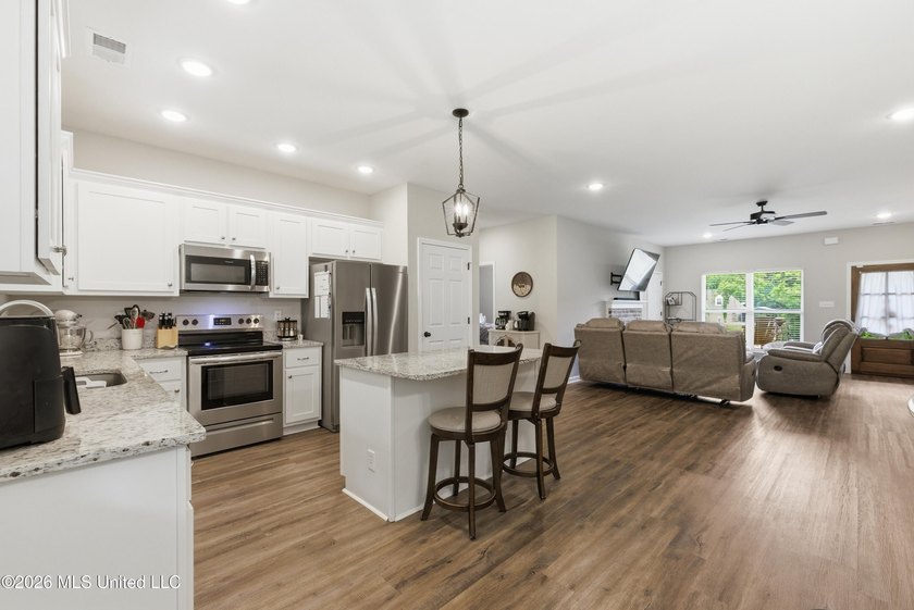 Better than New ~ Built in 2023 ~ 4 Bedroom 3 Bath Home with - photo 8