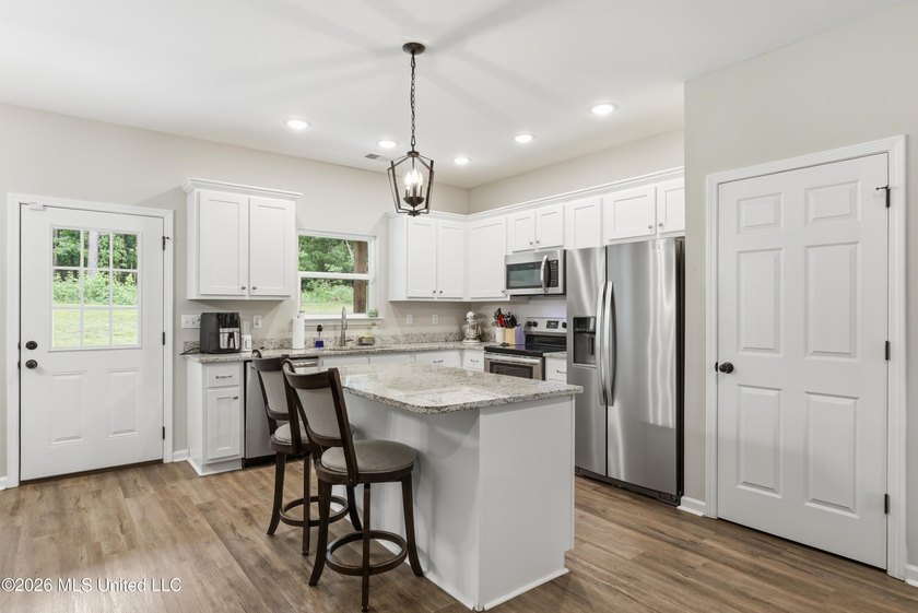 Better than New ~ Built in 2023 ~ 4 Bedroom 3 Bath Home with - photo 9