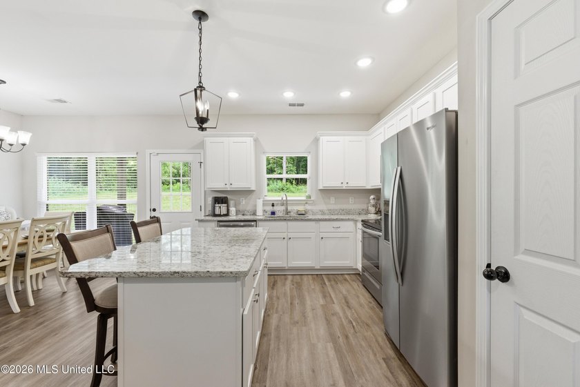Better than New ~ Built in 2023 ~ 4 Bedroom 3 Bath Home with - photo 10