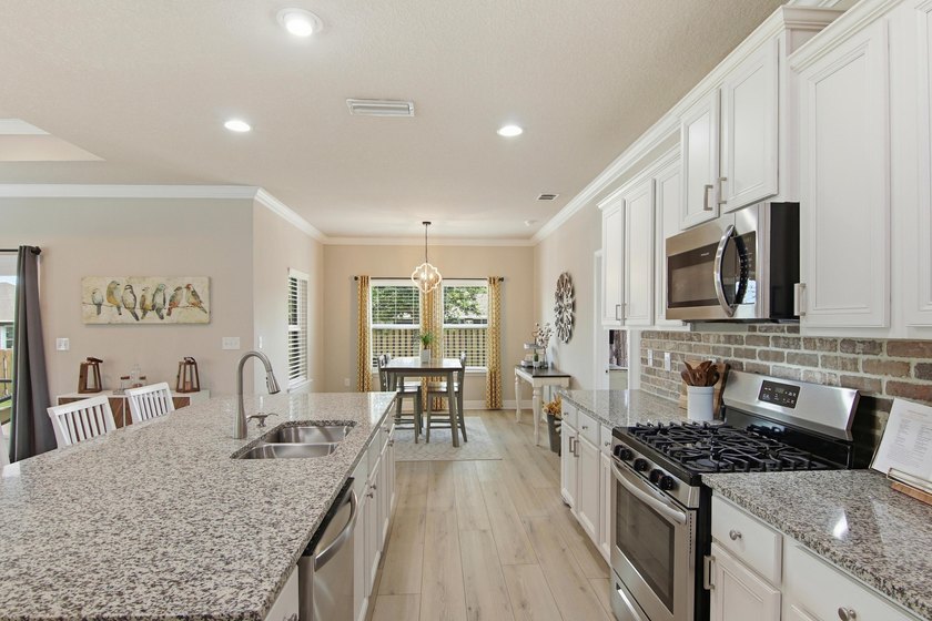 Welcome to 100 Norwich Rd, a beautifully enhanced residence in - photo 11