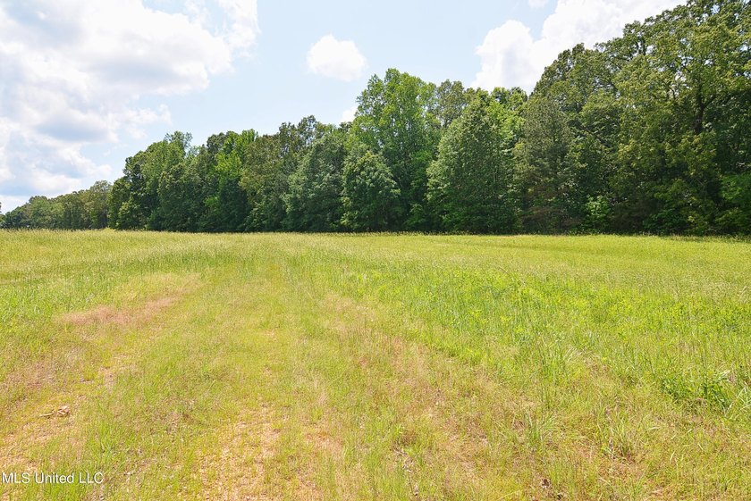 Gorgeous waterfront lot in the upscale, gated subdivision of - photo 2