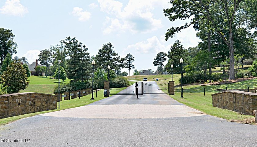 Gorgeous waterfront lot in the upscale, gated subdivision of - photo 4