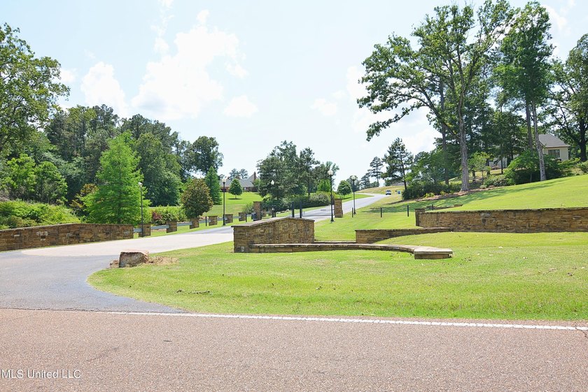 Gorgeous waterfront lot in the upscale, gated subdivision of - photo 5