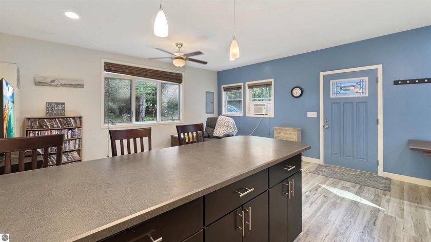 This two-bedroom, one-bath home is located across the street - photo 9