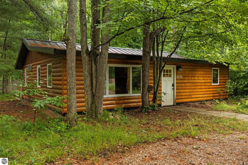 Nestled in a peaceful lake community just 500 feet from - photo 2