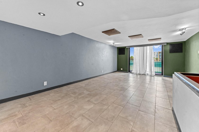 Stylishly updated 2-bedroom, 1.5-bathroom corner unit in the - photo 9