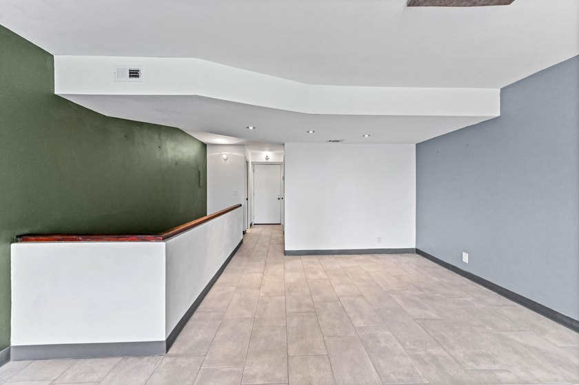 Stylishly updated 2-bedroom, 1.5-bathroom corner unit in the - photo 10