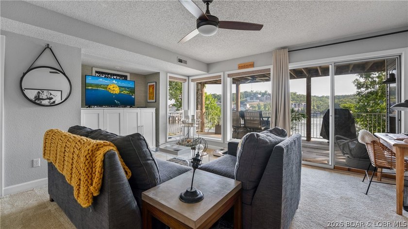 Check out this TWO story lakefront condo at the beautiful Shores - photo 15