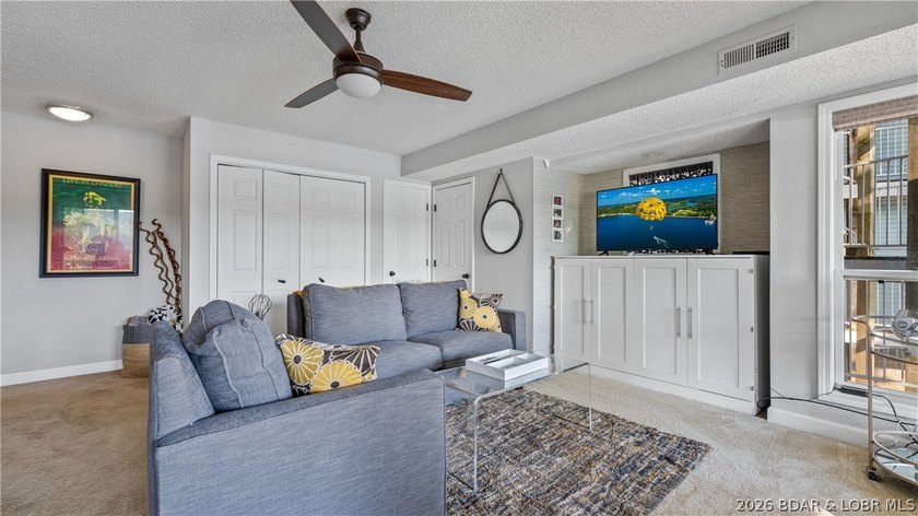 Check out this TWO story lakefront condo at the beautiful Shores - photo 16