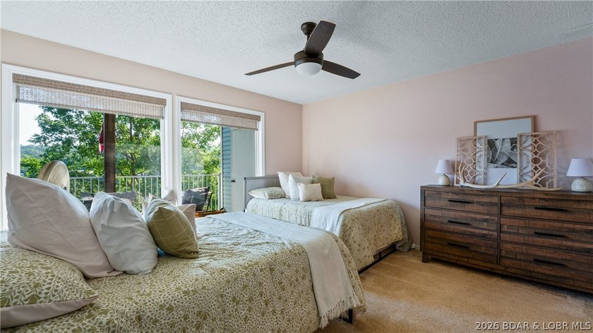 Check out this TWO story lakefront condo at the beautiful Shores - photo 18