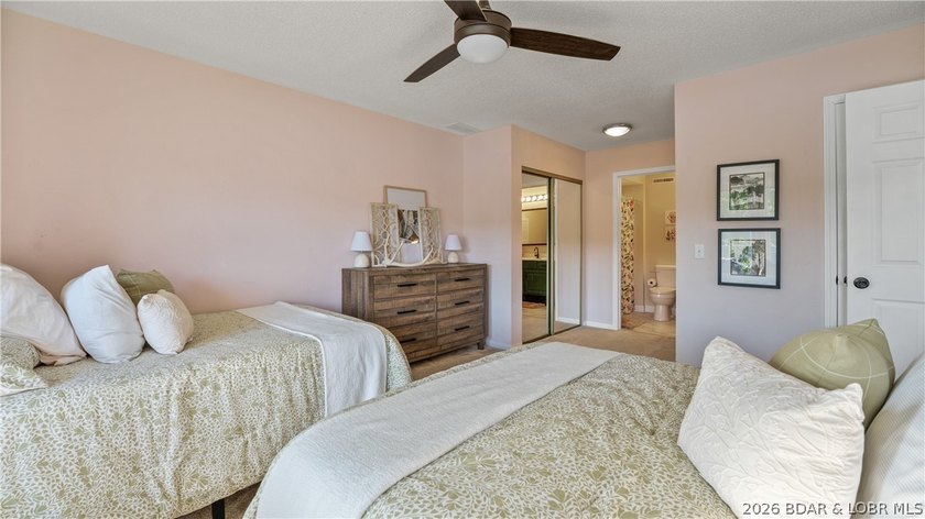 Check out this TWO story lakefront condo at the beautiful Shores - photo 19