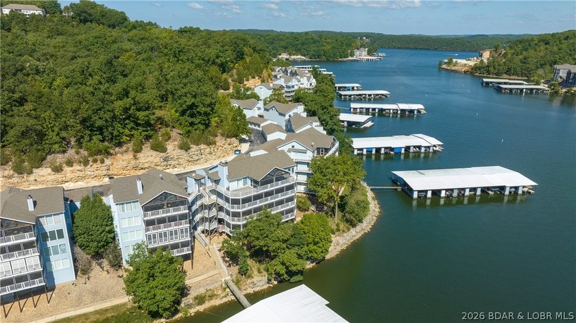 Check out this TWO story lakefront condo at the beautiful Shores - photo 33
