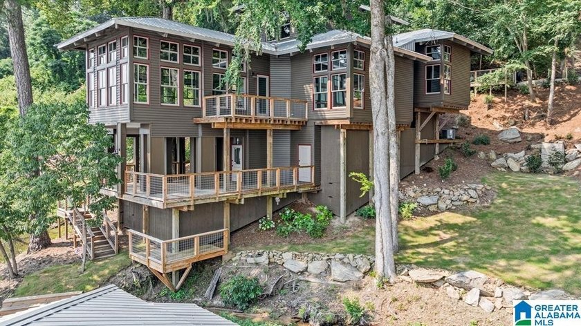 Nestled on the shores of Jordan Lake, this breathtaking 3,314 sq - photo 2