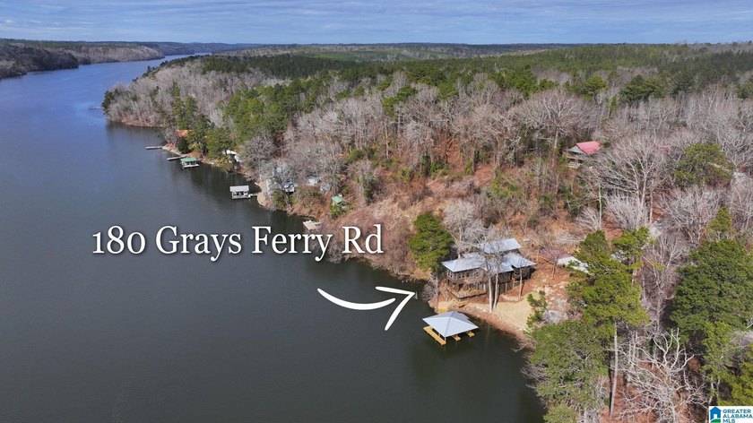 Nestled on the shores of Jordan Lake, this breathtaking 3,314 sq - photo 4