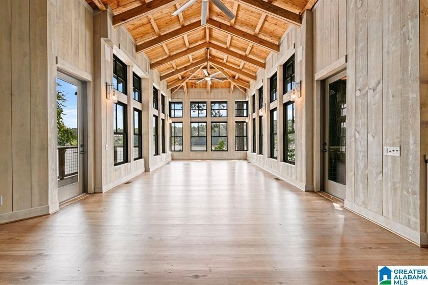 Nestled on the shores of Jordan Lake, this breathtaking 3,314 sq - photo 6