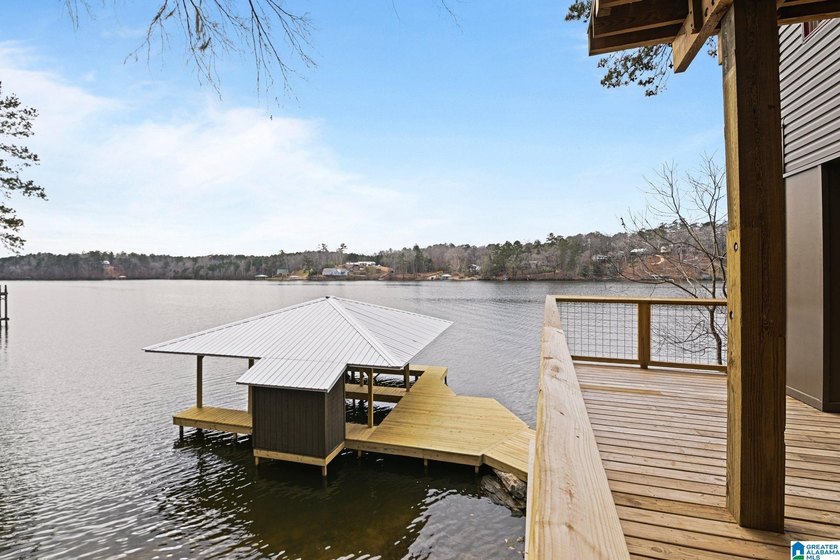 Nestled on the shores of Jordan Lake, this breathtaking 3,314 sq - photo 10