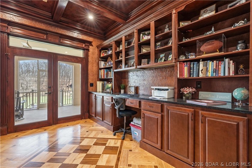 Set on the private waters of Treeline Lake in Four Seasons, this - photo 15