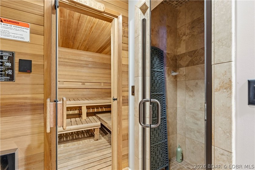 Set on the private waters of Treeline Lake in Four Seasons, this - photo 34