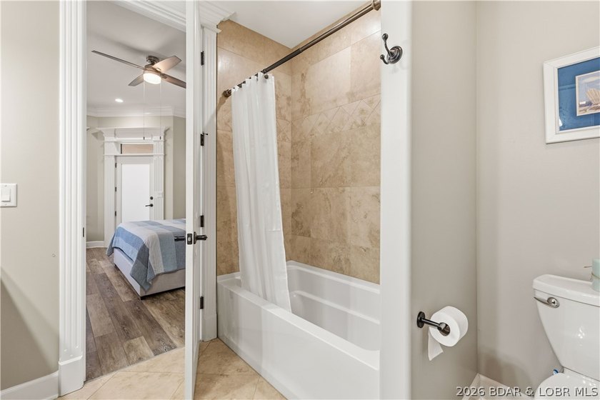 Set on the private waters of Treeline Lake in Four Seasons, this - photo 37