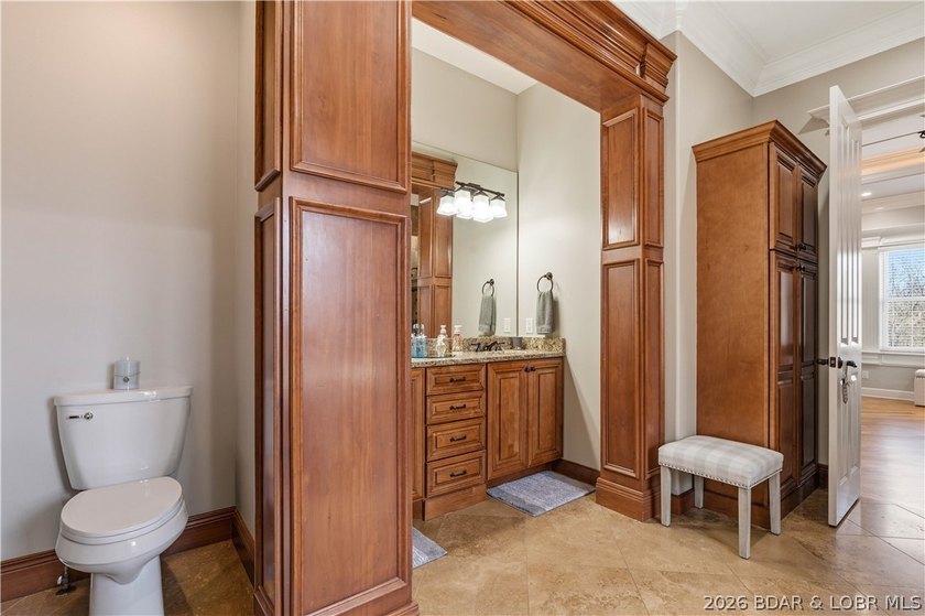 Set on the private waters of Treeline Lake in Four Seasons, this - photo 42