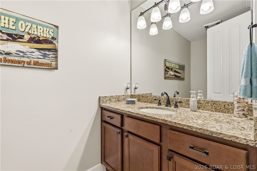 Set on the private waters of Treeline Lake in Four Seasons, this - photo 44