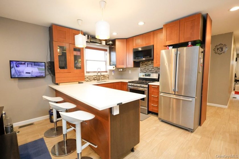 This larger-than-average corner residence offers outstanding - photo 3