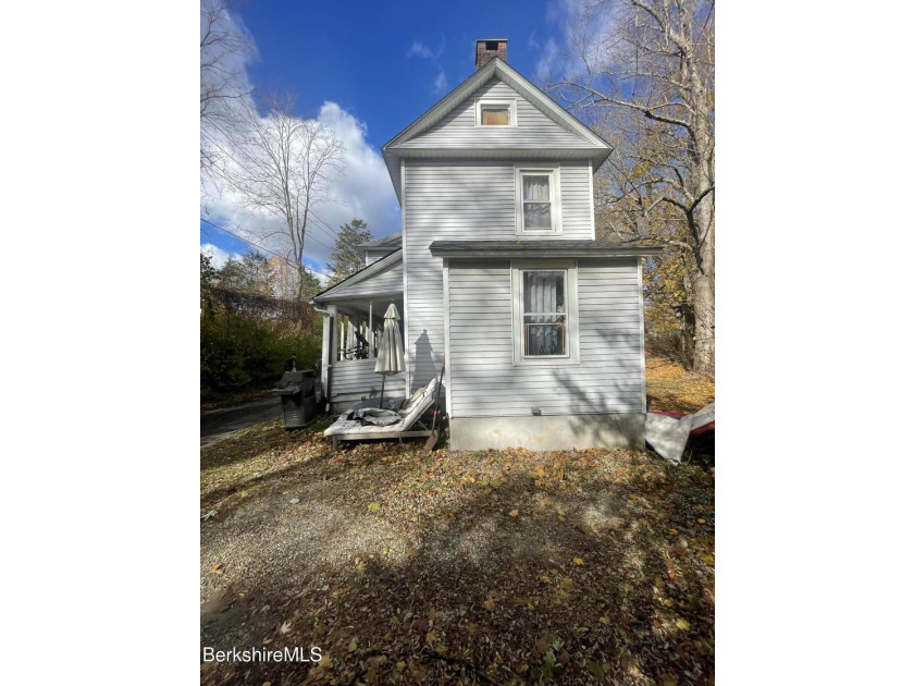 Welcome to 41 Pearl Street- a 1900s two-family residence nestled - photo 3
