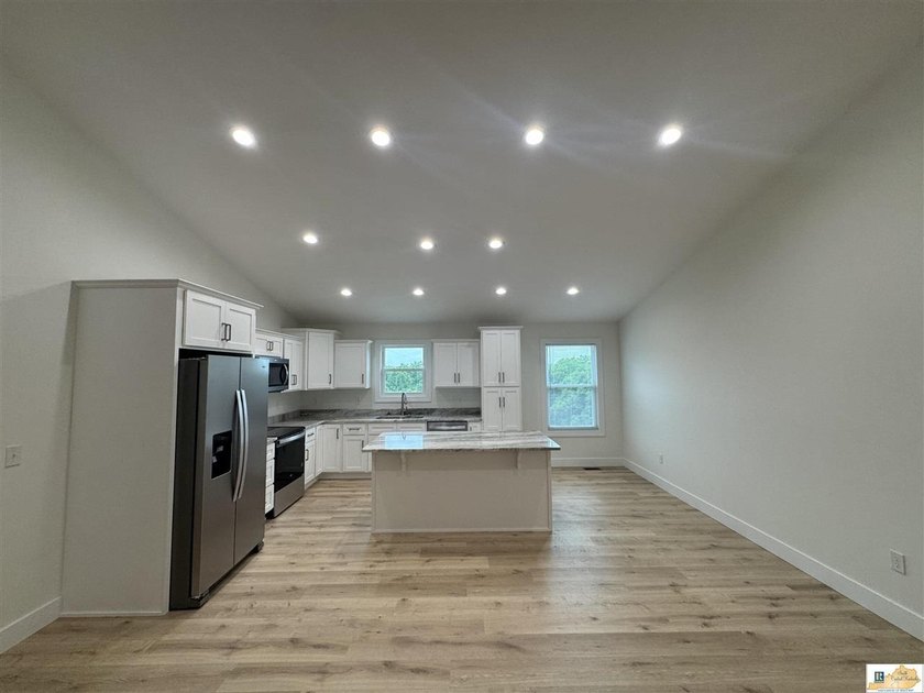 NEW CONSTRUCTION home with 3-car garages &amp; offering 1625 +/- SF - photo 3