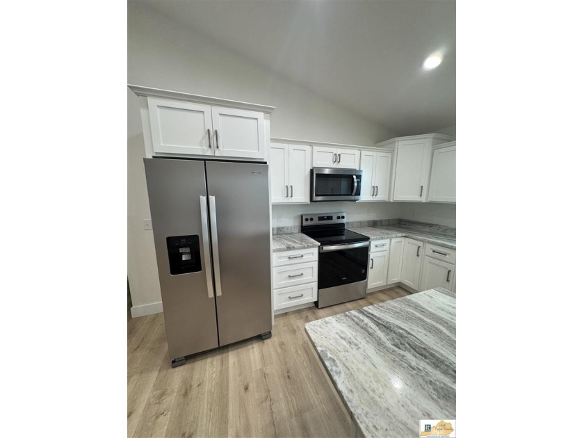 NEW CONSTRUCTION home with 3-car garages &amp; offering 1625 +/- SF - photo 6