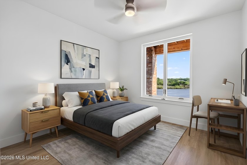 Two bedrooms. Two baths. Direct waterfront. Private balcony over - photo 9