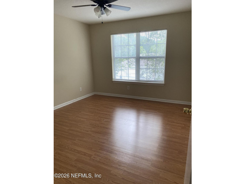One bedroom, one bathroom condo on second floor. Laminate - photo 8