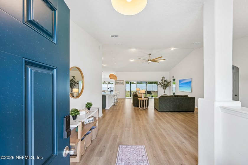 Welcome to this beautifully appointed Seagate custom-built home - photo 3
