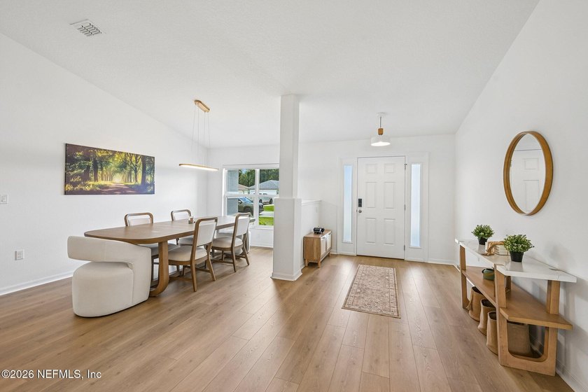 Welcome to this beautifully appointed Seagate custom-built home - photo 5