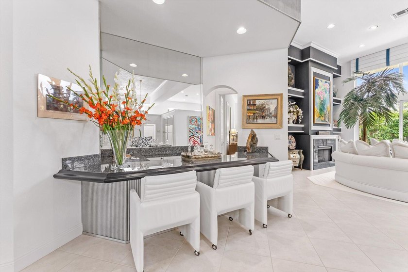 Nestled within the prestigious Woodfield Country Club, this - photo 15