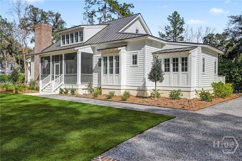 This stunning, brand-new Lowcountry cottage features 4 bedrooms - photo 5