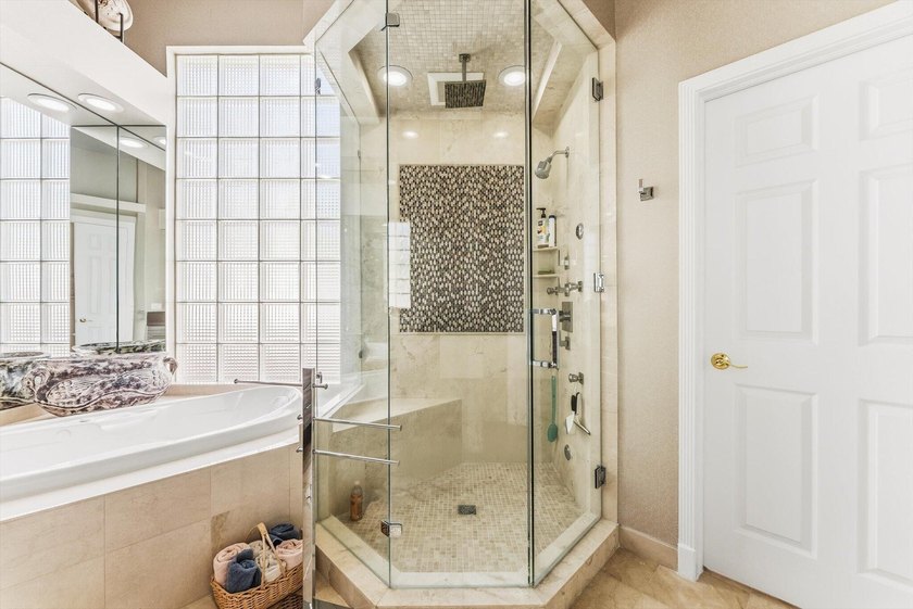 Nestled within the prestigious Woodfield Country Club, this - photo 27