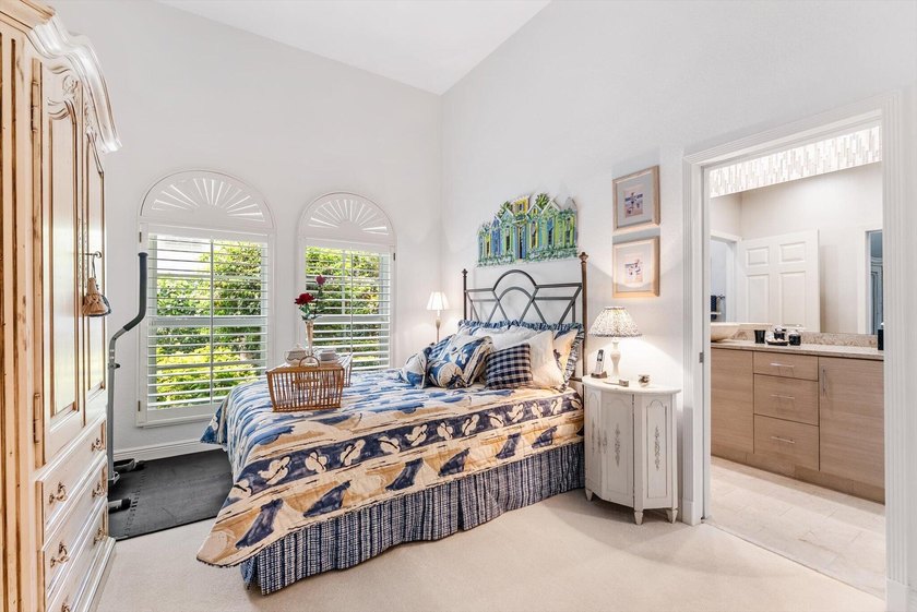Nestled within the prestigious Woodfield Country Club, this - photo 30