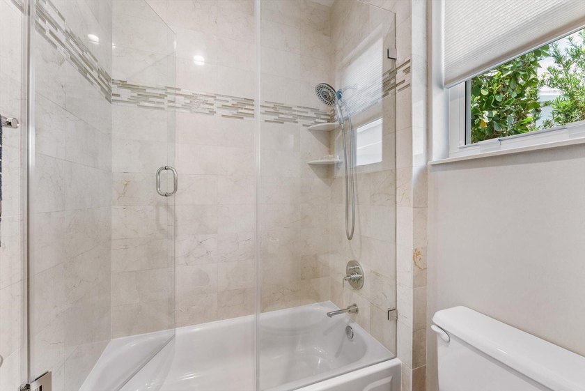 Nestled within the prestigious Woodfield Country Club, this - photo 33