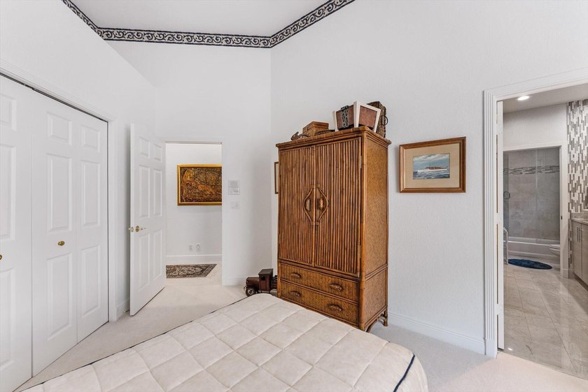 Nestled within the prestigious Woodfield Country Club, this - photo 36