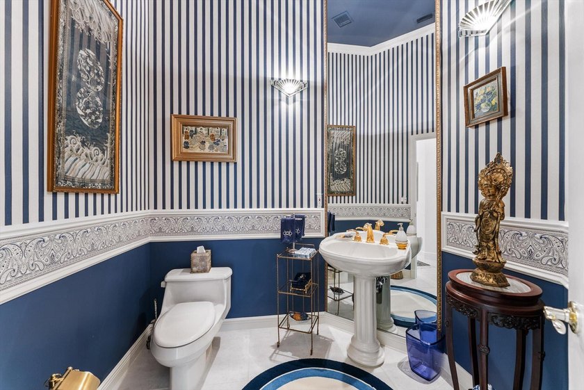 Nestled within the prestigious Woodfield Country Club, this - photo 37