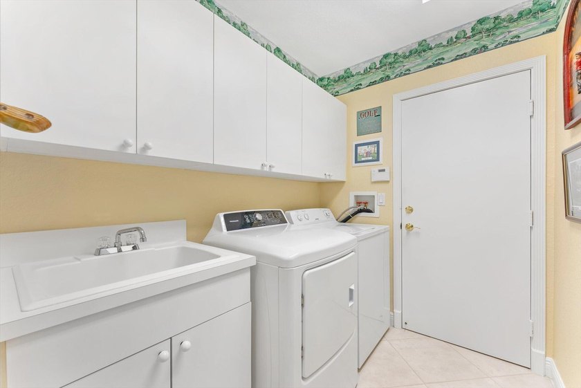 Nestled within the prestigious Woodfield Country Club, this - photo 38
