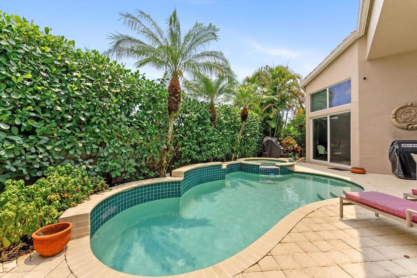 Nestled within the prestigious Woodfield Country Club, this - photo 40