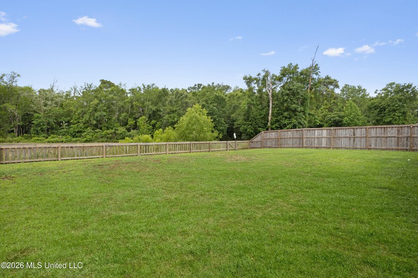 Tucked away on a premium lot in The Enclave, this beautifully - photo 4